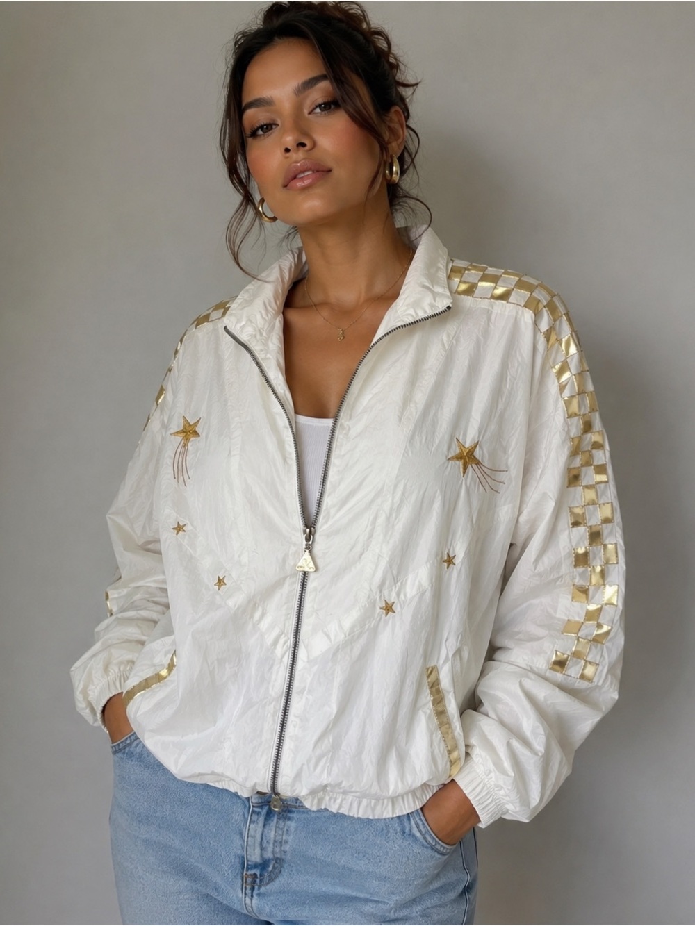 White Bomber Jacket with Gold Star Embellishments